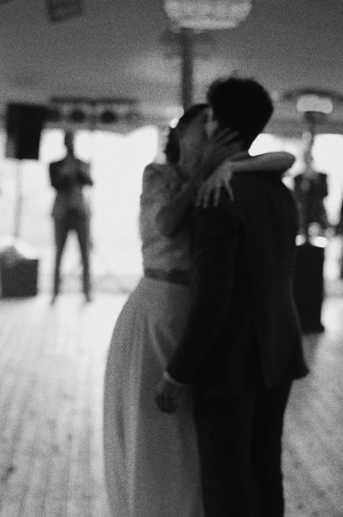 A romantic black and white photo of a couple's first dance in Antwerp, Belgium.